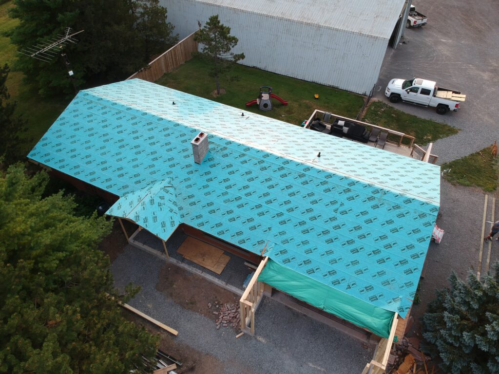 Roof underlayment being installed on a large Niagara-area home