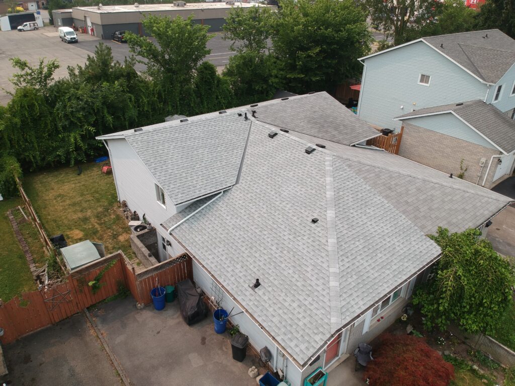 Welland home with a new light grey shingle roof, aerial view