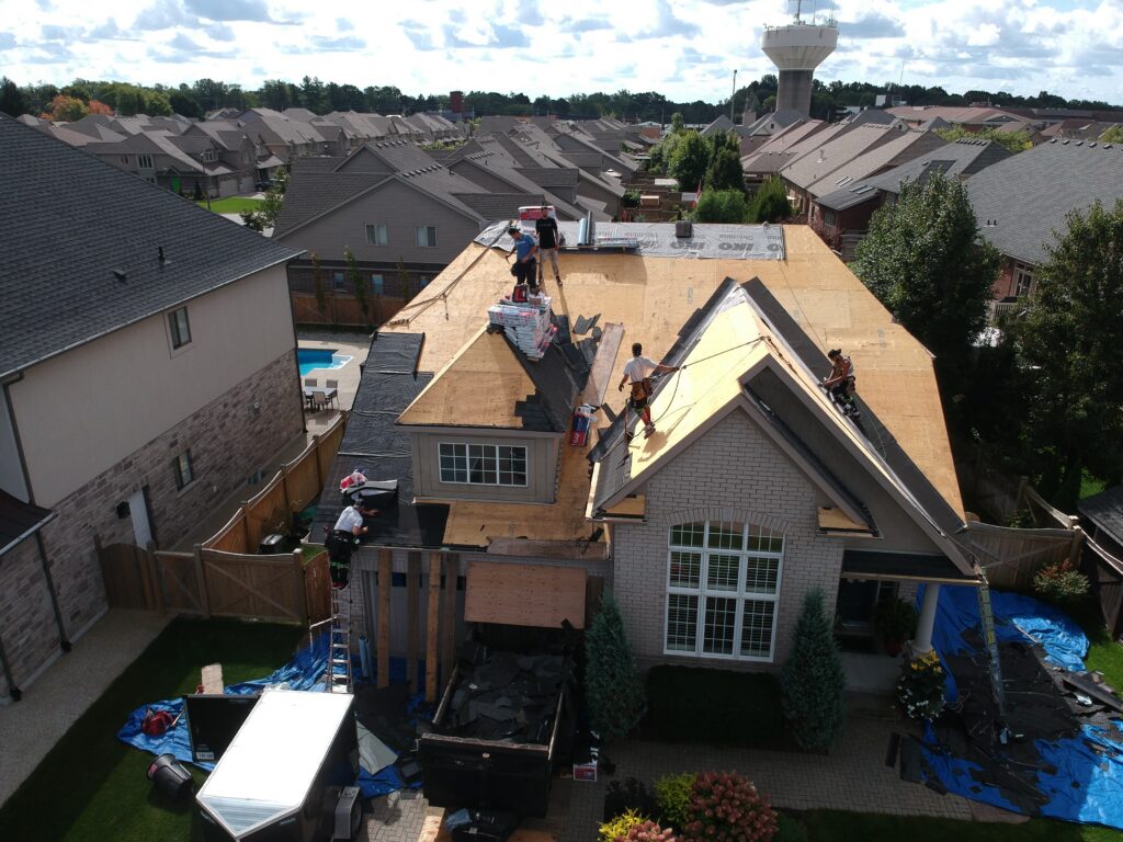 Two-storey home in Pelham with a new shingle roof, aerial view